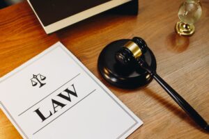 Legal documents accompanied by a gavel.