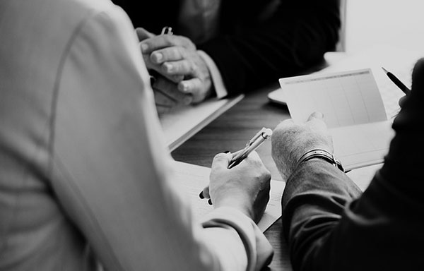 Jones Act Mediation, business people at a table